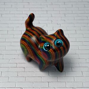 Multicolor wood cat carving
